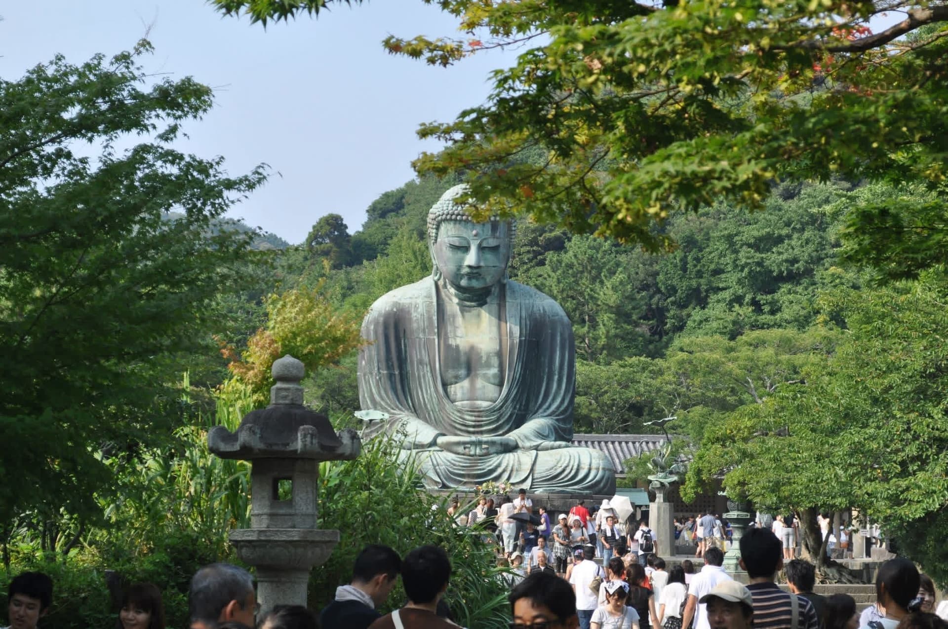 The Great Buddha (Daibutsu) of Kamakura amid greenery