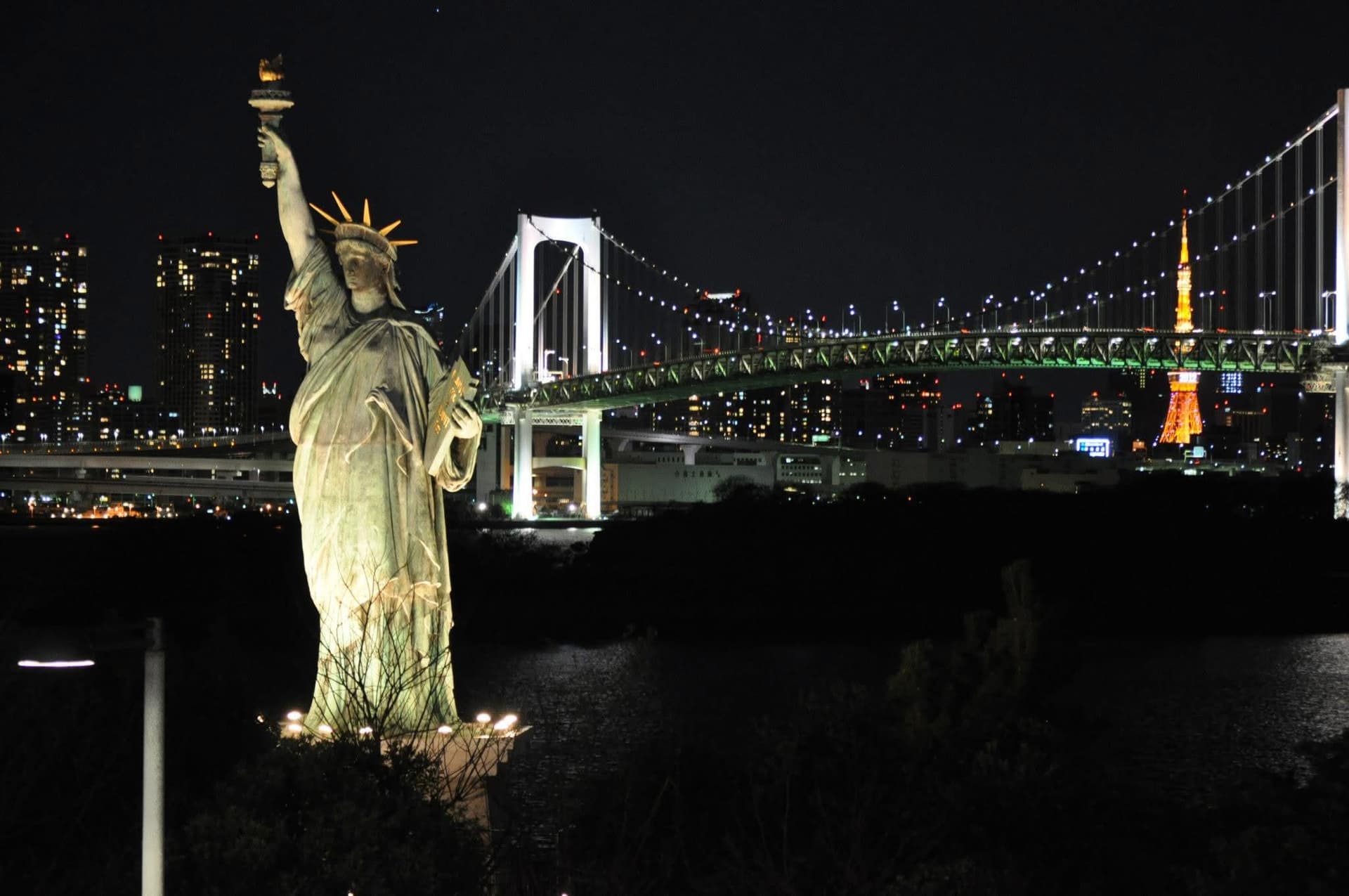 Rainbow Bridge and the Tokyo skyline at night, seen from Odaiba