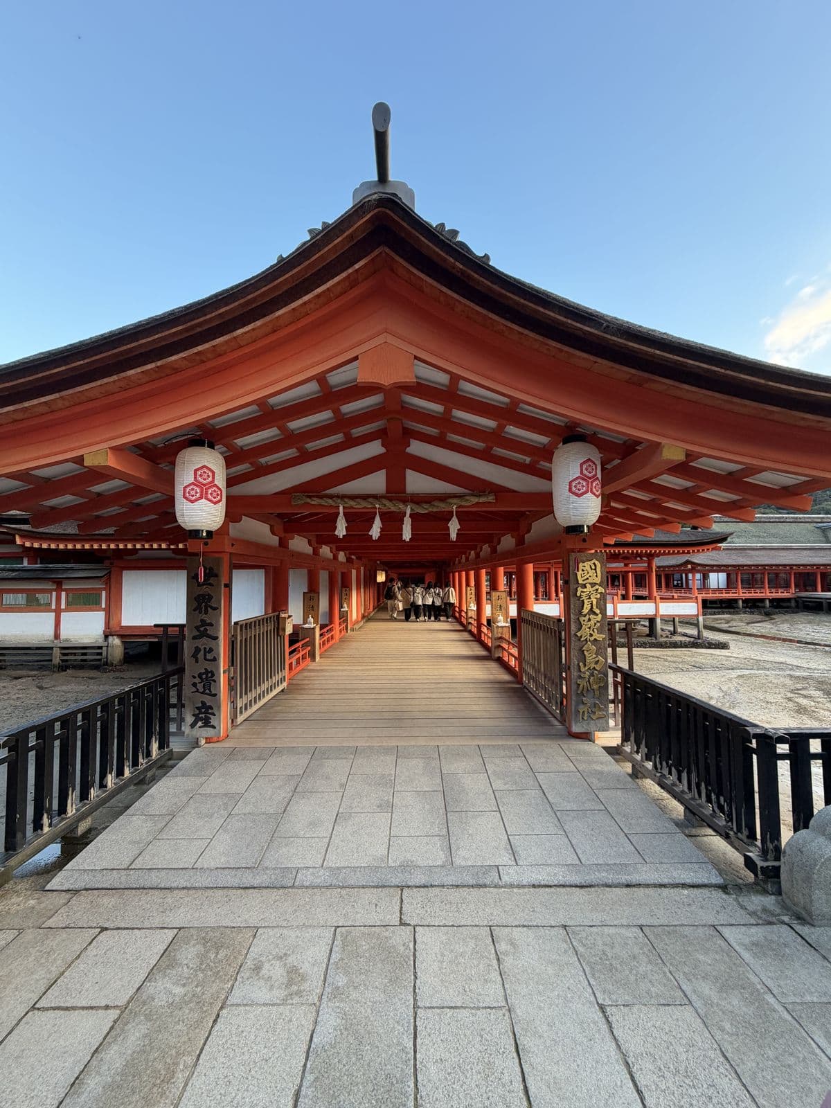 Serene shrine walkway with vermilion torii gates