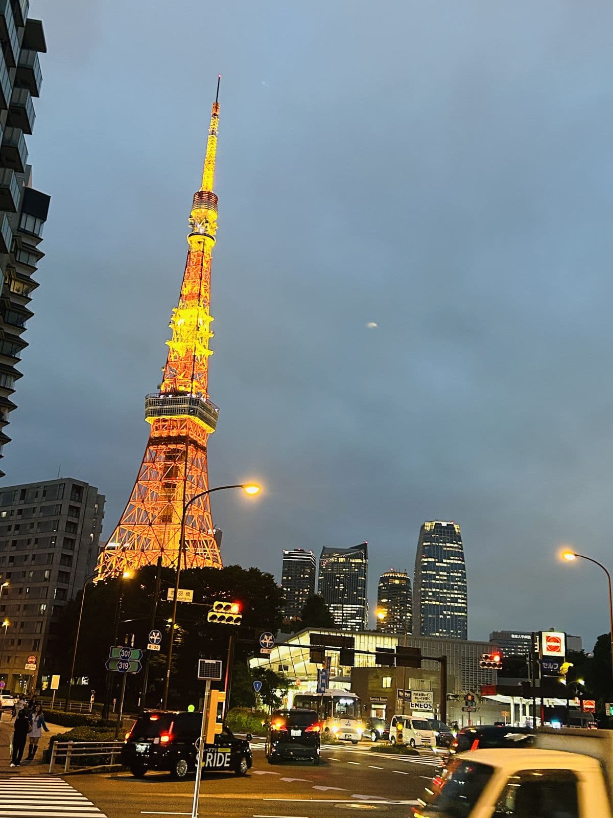 Tokyo Tower lit orange at dusk
